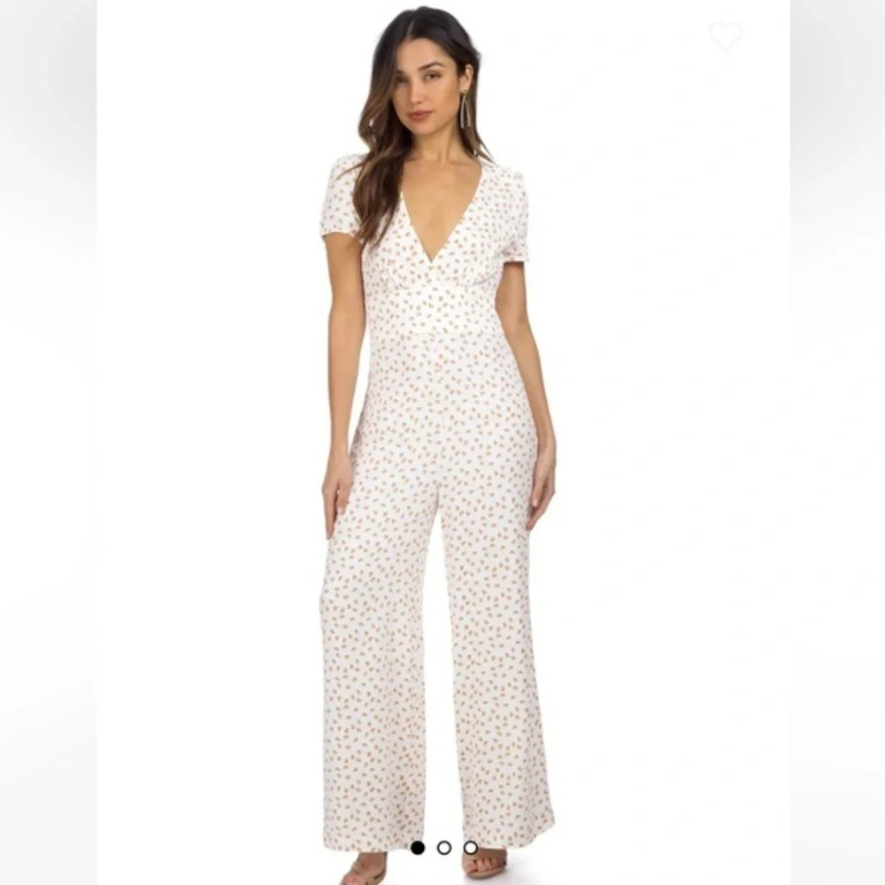 Free People Mia Jumpsuit size 0 peach print jumpsuit cream color